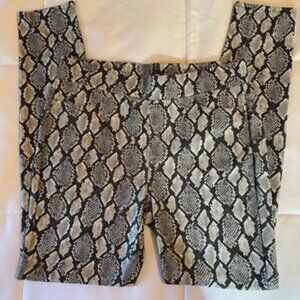 EUC= Michael Kors Snakeskin Pull-on Pants. Size Large